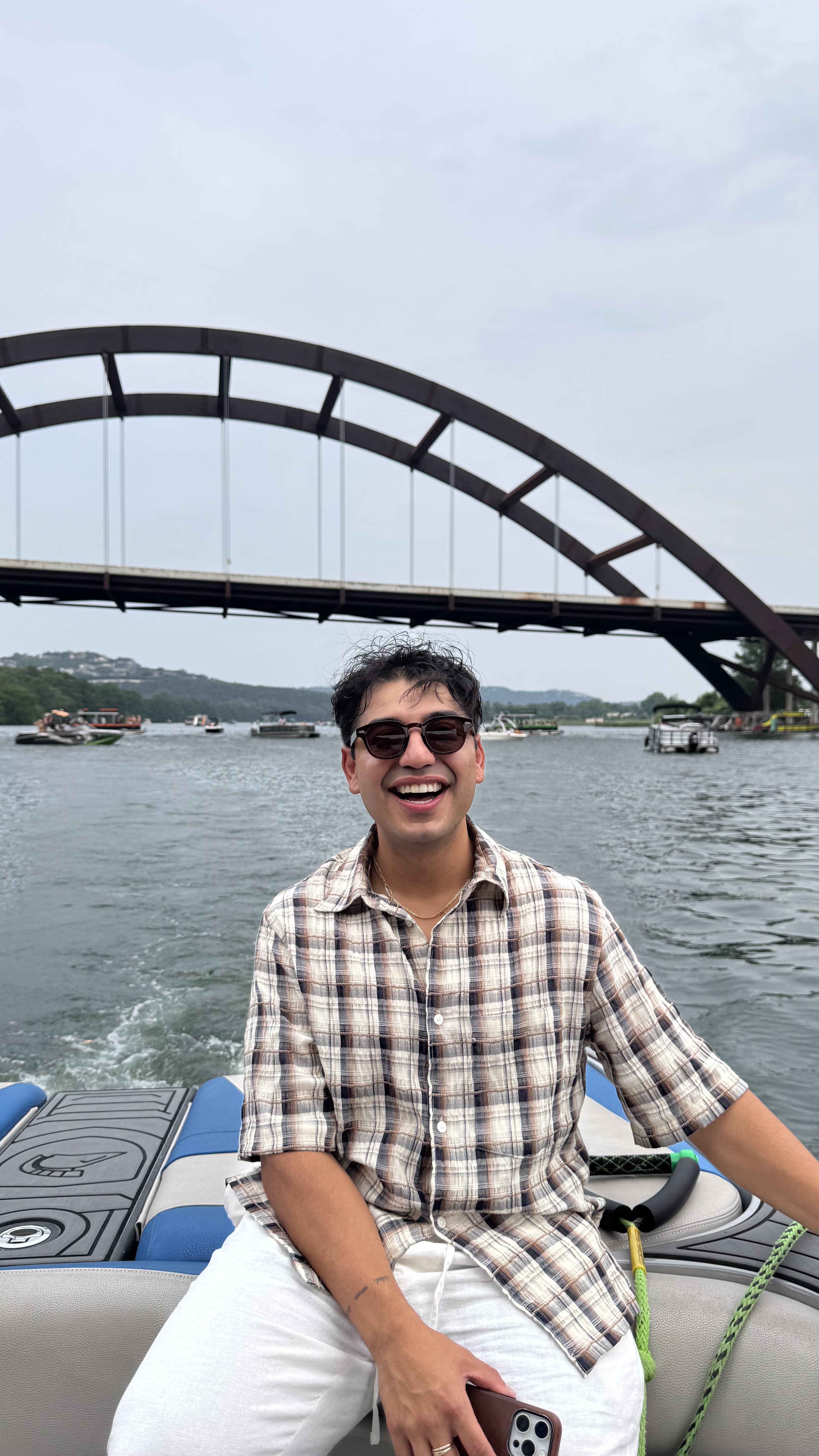 Gibran on Lake Austin with Pennybacker Bridge